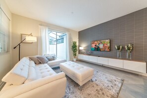 Flat-screen TV, video game console