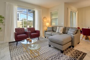 Flat-screen TV, video game console