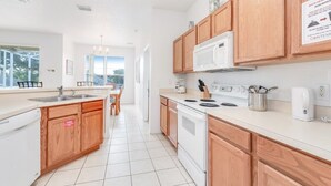 Stovetop, dishwasher, cookware/dishes/utensils - Ev8084ha - Highlands Reserve - 4 Bed 3 Baths Villa (Davenport)