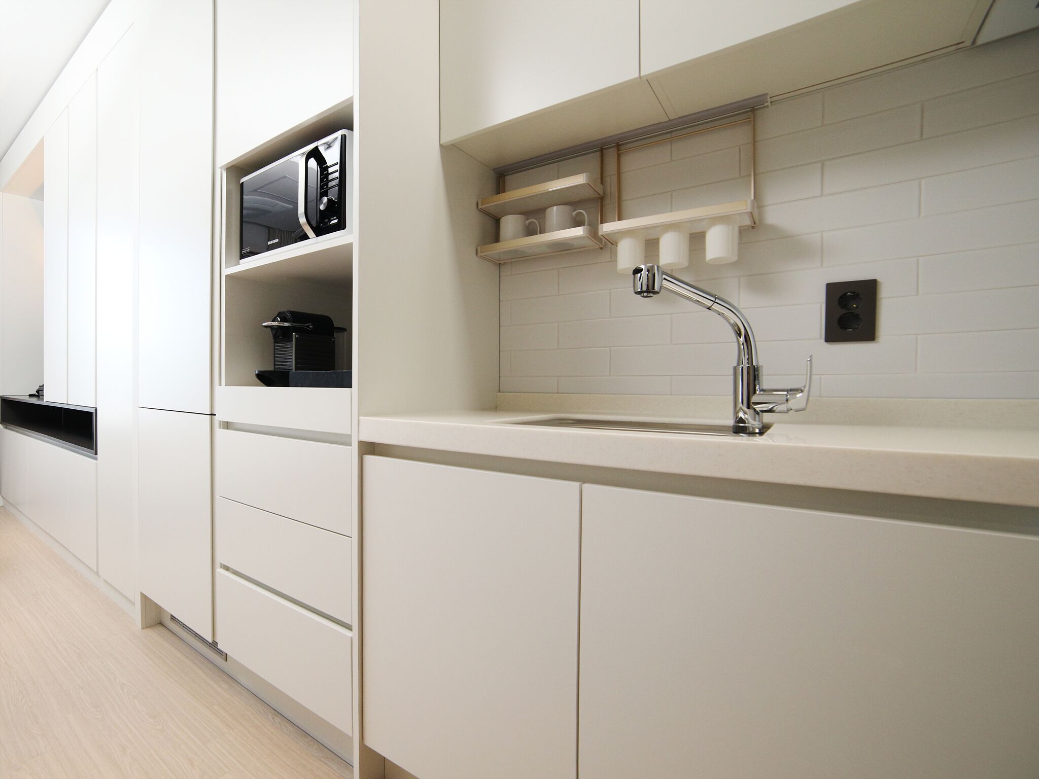 full-sized fridge, microwave, espresso maker, coffee/tea maker