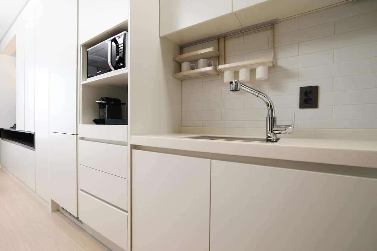 full-sized fridge, microwave, espresso maker, coffee/tea maker