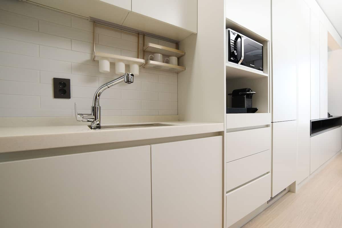 full-sized fridge, microwave, espresso maker, coffee/tea maker