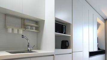 Full-size fridge, microwave, espresso maker, coffee/tea maker