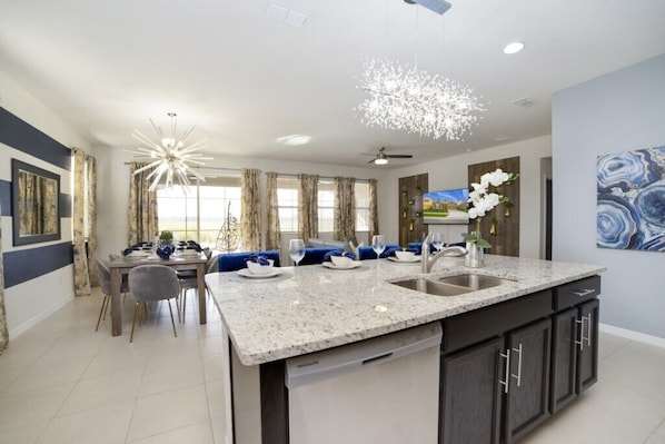 Parrilla de estufa, lavavajillas y utensilios de cocina