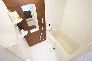 Apartment | Bathroom | Separate bathtub and shower, free toiletries, hair dryer, slippers - Terry's Apartment Namba South VI AD04A (Osaka)