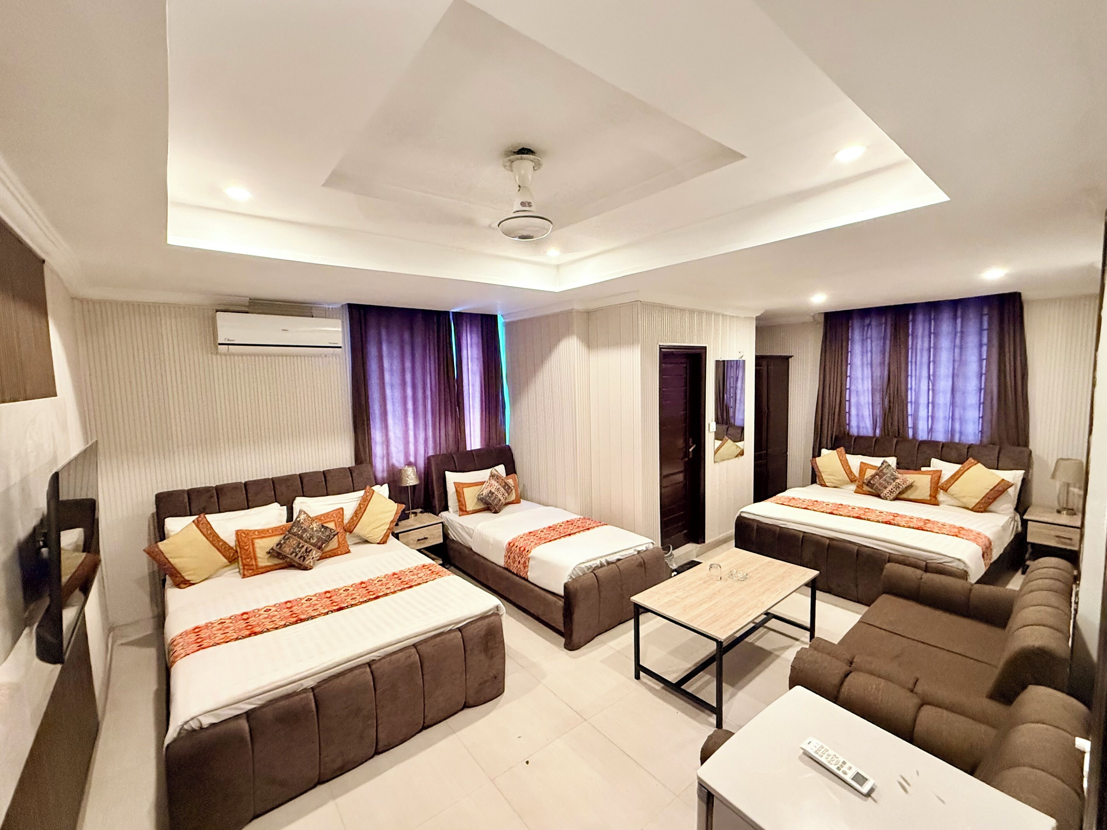 Family Quadruple Room, City View | Premium bedding, down comforters, pillowtop beds, desk