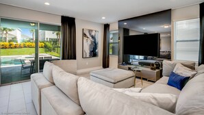 Flat-screen TV, video game console - Aco8059ha - The Encore Club Resort - 6 Bed 5 Baths House (Kissimmee)