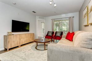 Flat-screen TV, video game console