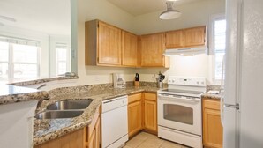 Stovetop, dishwasher, cookware/dishes/utensils - Aco7954ha - Runaway Beach Club - 2 Bed 2 Baths Apartment (Kissimmee)