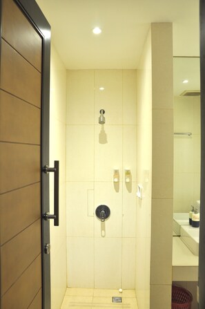 Shower, free toiletries, slippers, towels