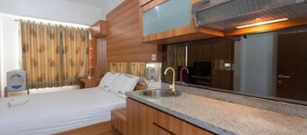 Apartemen Taman Melati Margonda by Winroom