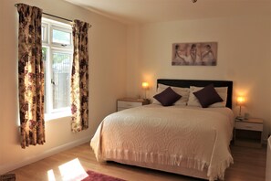 Apartment, 1 Bedroom | 1 bedroom, blackout curtains, iron/ironing board, free WiFi