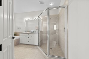 Bathtub, hair dryer, towels, soap