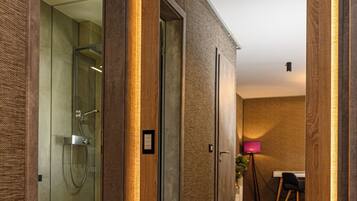 Superior Apartment | Living area | 120-inch flat-screen TV with cable channels, Smart TV, heated floors