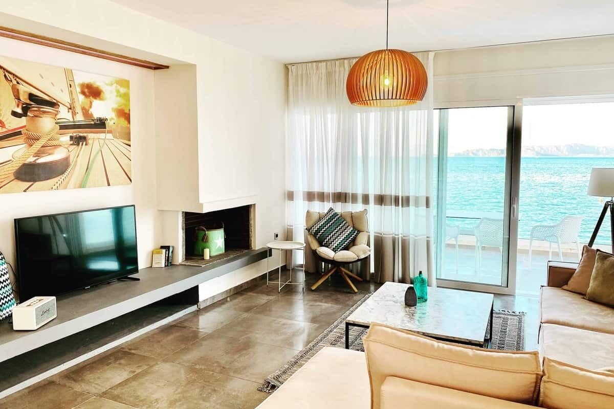 Luxury Suite, Sea View (Tyche) | Living area | 42-inch Smart TV with digital channels, TV