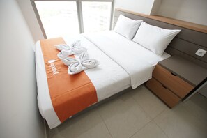 Apartment, 2 Bedrooms | 2 bedrooms, bed sheets - Apatel Gold Coast (Jakarta)