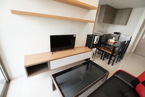 Apartment, 2 Bedrooms | Living area | LCD TV - Apatel Gold Coast (Jakarta)
