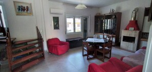 Smart TV, fireplace, books