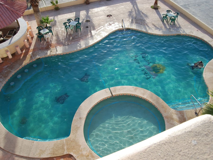 Outdoor pool, open 8:00 AM to 10:00 PM, free cabanas, pool umbrellas