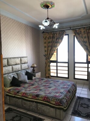 1 bedroom, blackout drapes, iron/ironing board, bed sheets