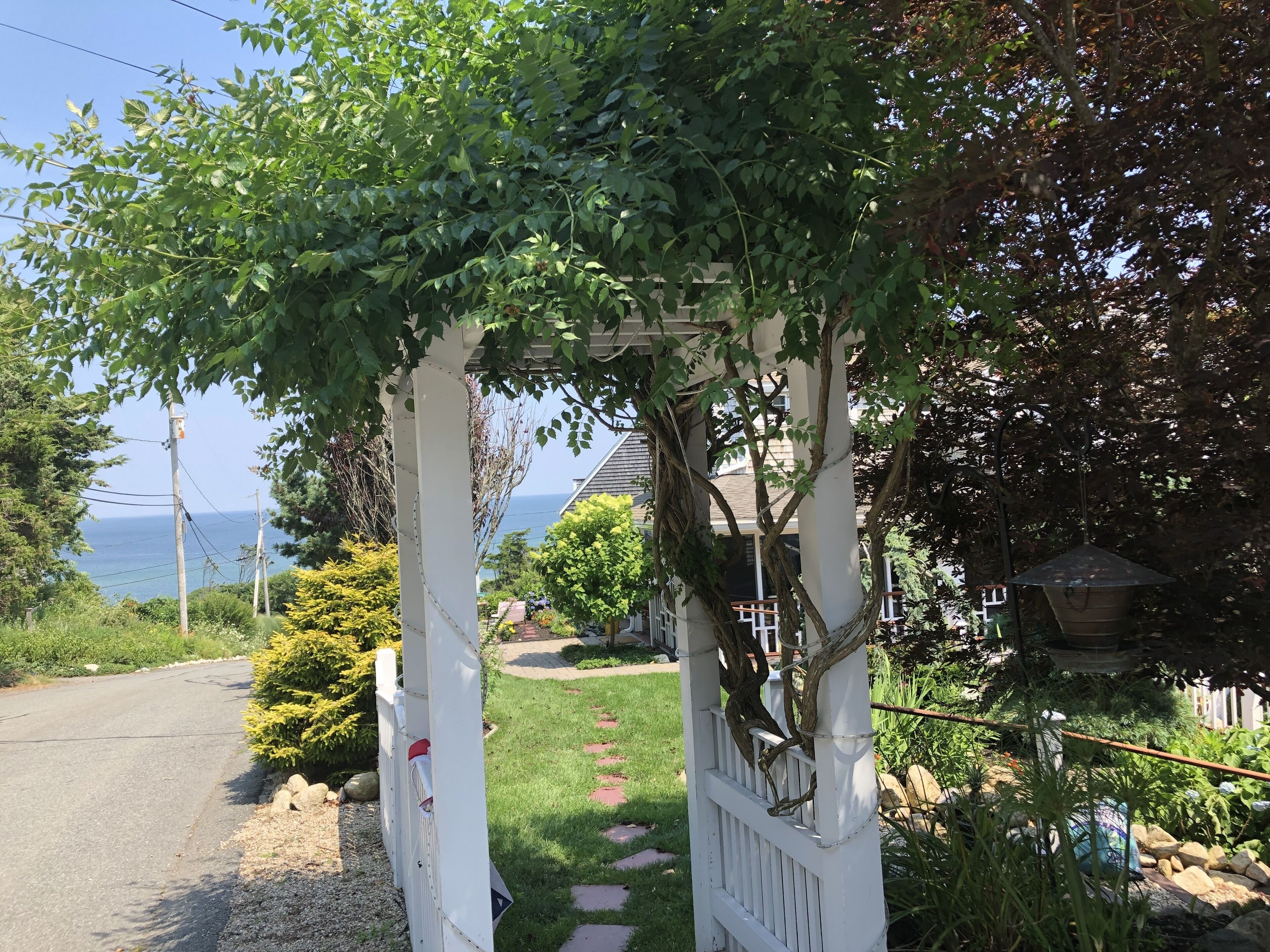 The arbor the welcomes you to the property.  