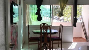 Apartment, 2 Bedrooms | Living area | 32-inch flat-screen TV with satellite channels, TV
