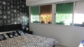 Apartment, 2 Bedrooms | 2 bedrooms, blackout drapes, iron/ironing board, bed sheets