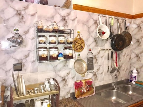 Apartment, 1 Bedroom | Private kitchen | Full-size fridge, stovetop, cookware/dishes/utensils