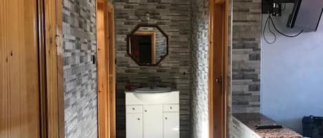 Apartment, 1 Bedroom | Living area | 32-inch flat-screen TV with satellite channels, TV