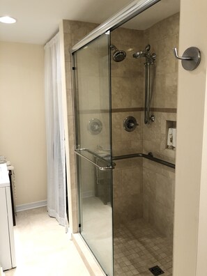 Shower, hair dryer, towels, soap