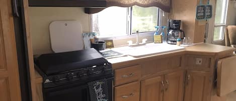Fridge, microwave, coffee/tea maker, toaster