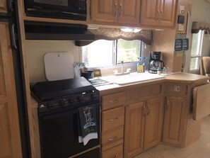 Fridge, microwave, coffee/tea maker, toaster