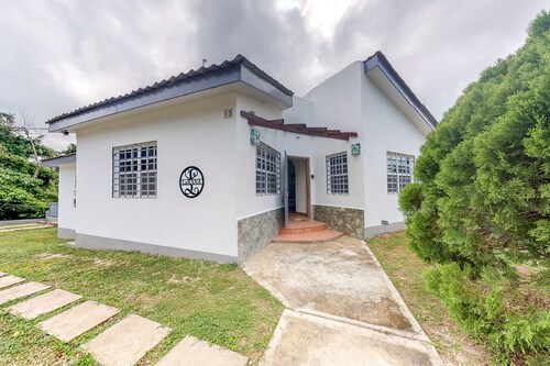 Welcoming home near town with private pool, jungle views, WiFi & partial AC