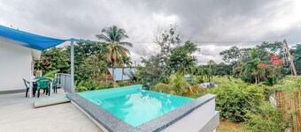 Welcoming home near town with private pool, jungle views, WiFi & partial AC