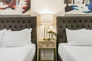 2 slaapkamers, een strijkplank/strijkijzer, beddengoed, rolstoeltoegang