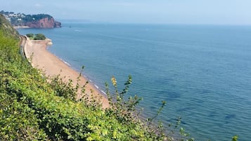 Plage, chaises longues
