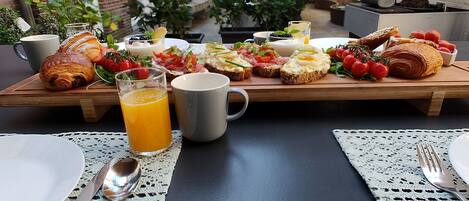 Daily local cuisine breakfast (EUR 12.5 per person)