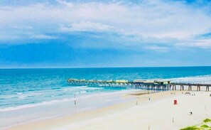 On the beach, sun loungers, beach towels