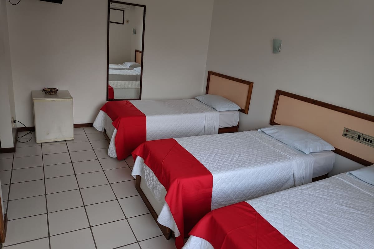 Triple Room | Minibar, in-room safe, desk, laptop workspace