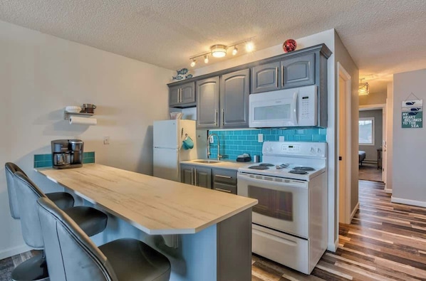 Fridge, microwave, oven, stovetop