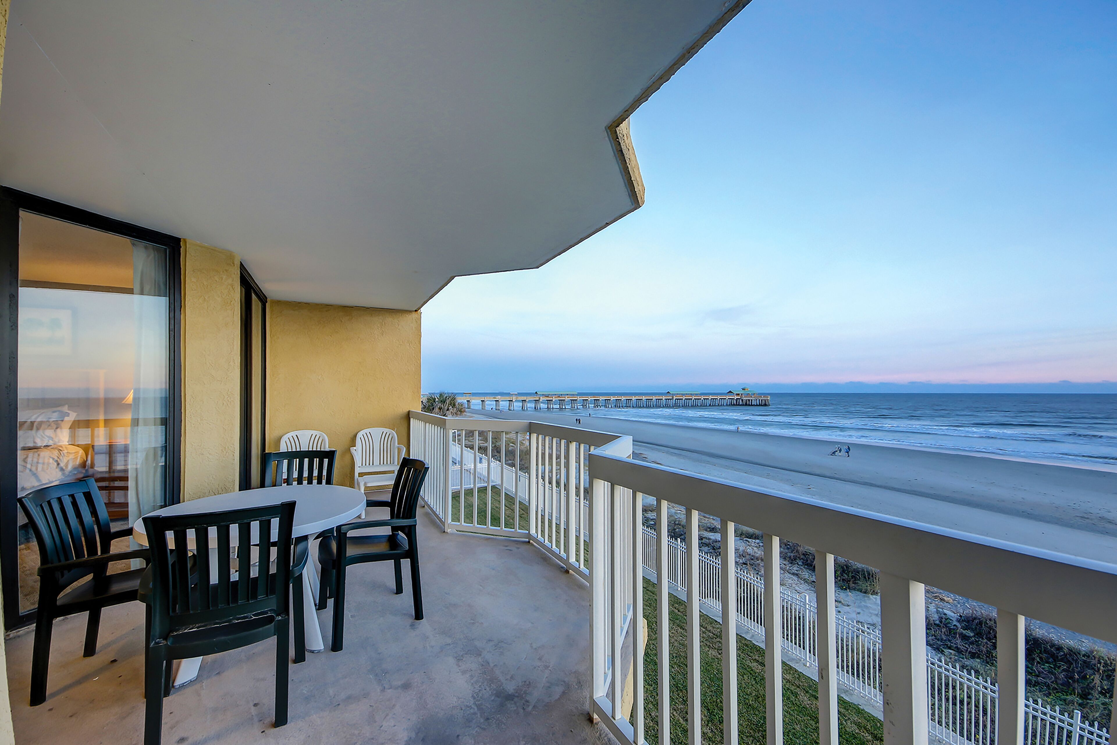 Oceanfront second-floor villa just steps from the beach w/ balcony & shared pool