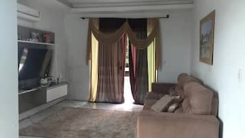 Comfort Apartment | Living area | TV