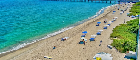 Enjoy a beachside retreat with access to a long stretch of sandy beach and a picturesque pier.