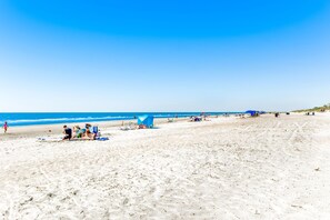 Guests can enjoy a relaxing beach experience with access to the calm sea and scenic views.