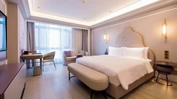Deluxe Room, 1 King Bed | Down comforters, in-room safe, individually decorated