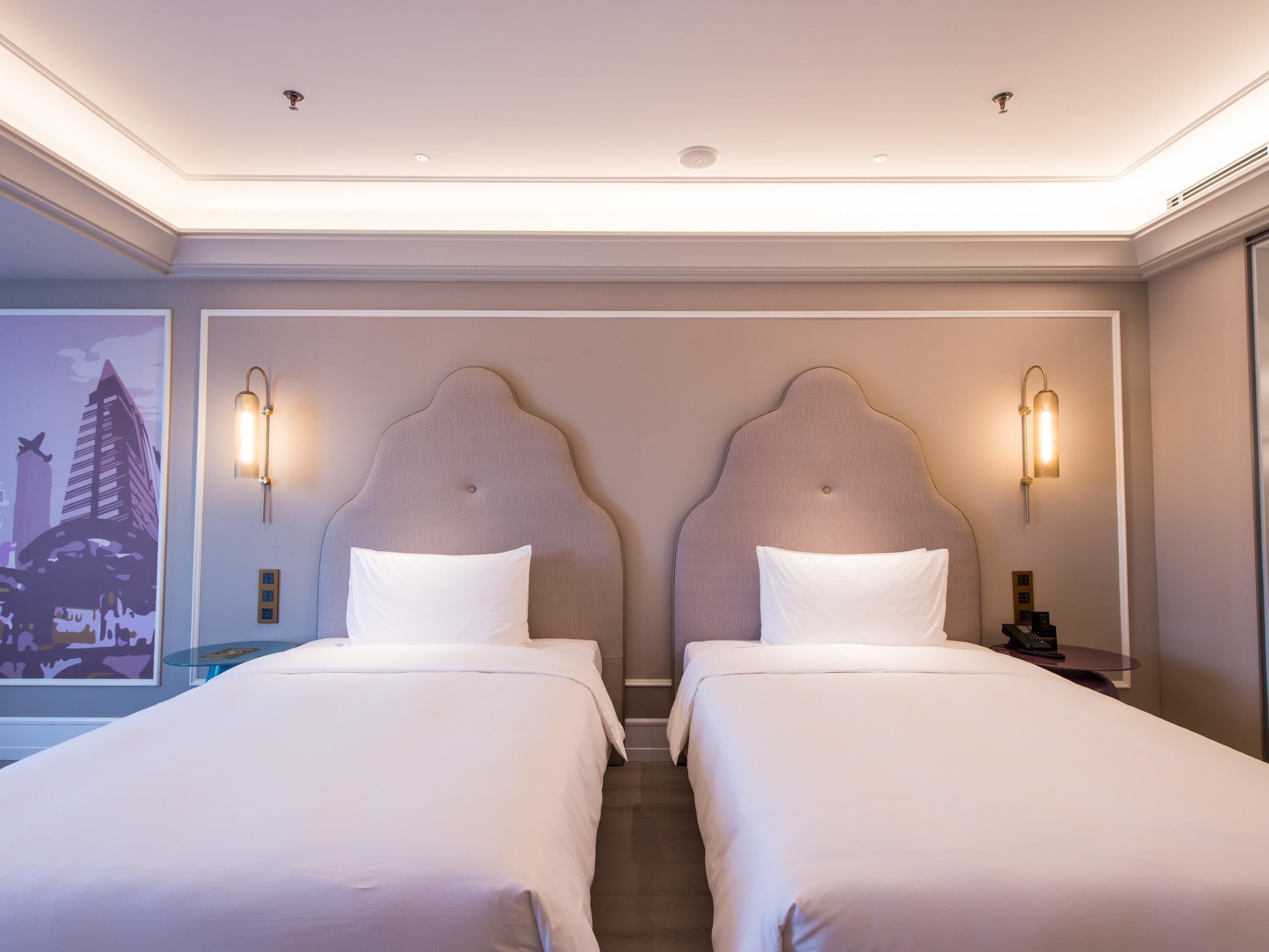 Quarto luxo, 2 camas de solteiro | Cofres nos quartos, individualmente decorados