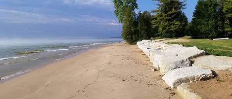 On the beach, sun-loungers