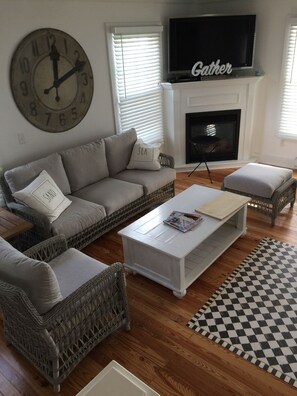 Smart TV, fireplace, books