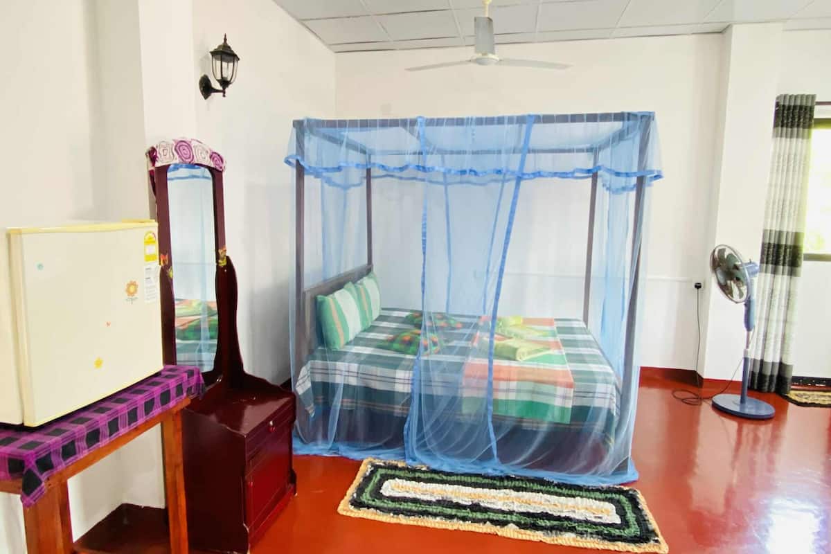 Chambre Double Confort | Coin séjour