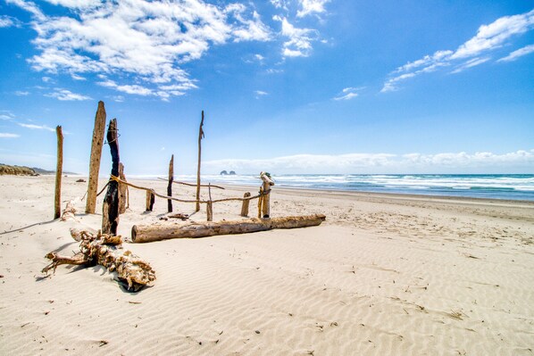 Enjoy a serene beach experience with a natural barrier and endless ocean views.